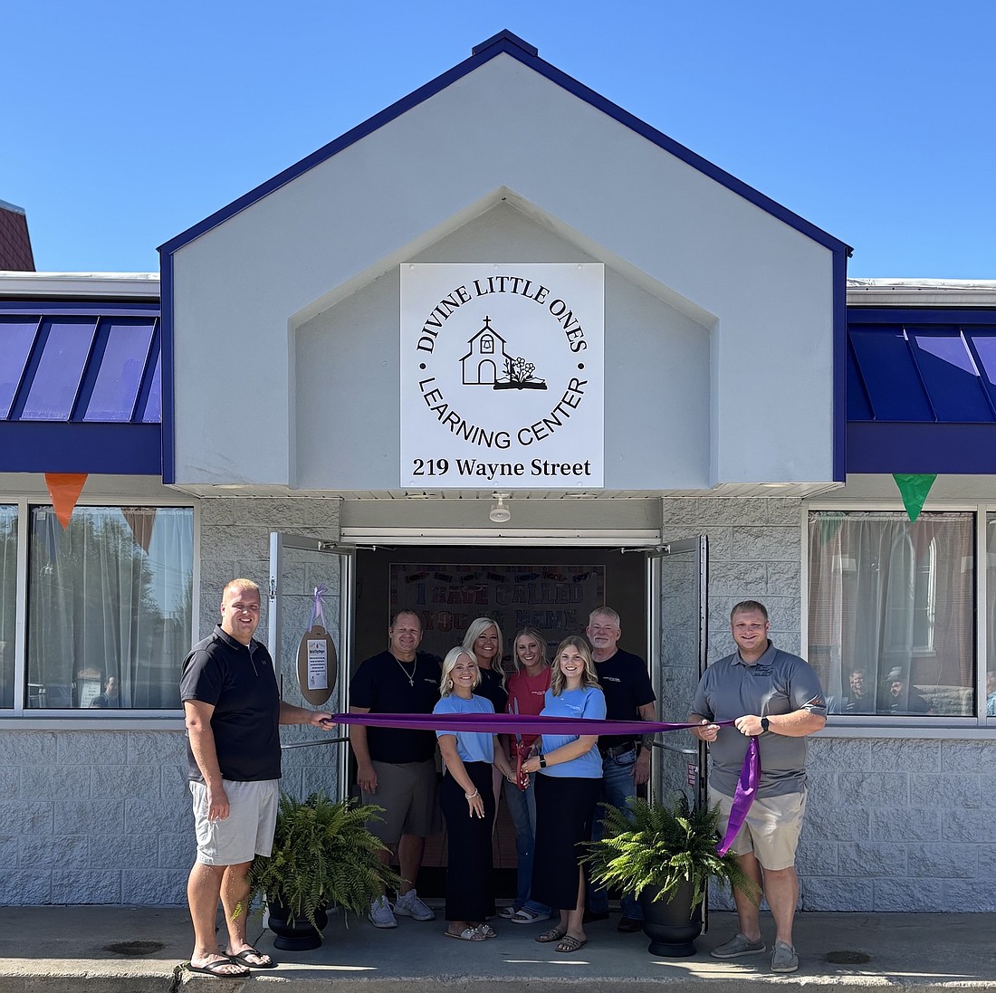 Divine Little Ones Learning Center is a new faith-based preschool. Pictured are Eric Brackman from the chamber, owner Rya Buschur with her parents Trent and Jodi Buschur, owner Kenadie Ervin and her parents Mitch Ervin and Sandy Ervin, and Thomas Shaw with Fort Recovery Chamber of Commerce. (Photo provided)
