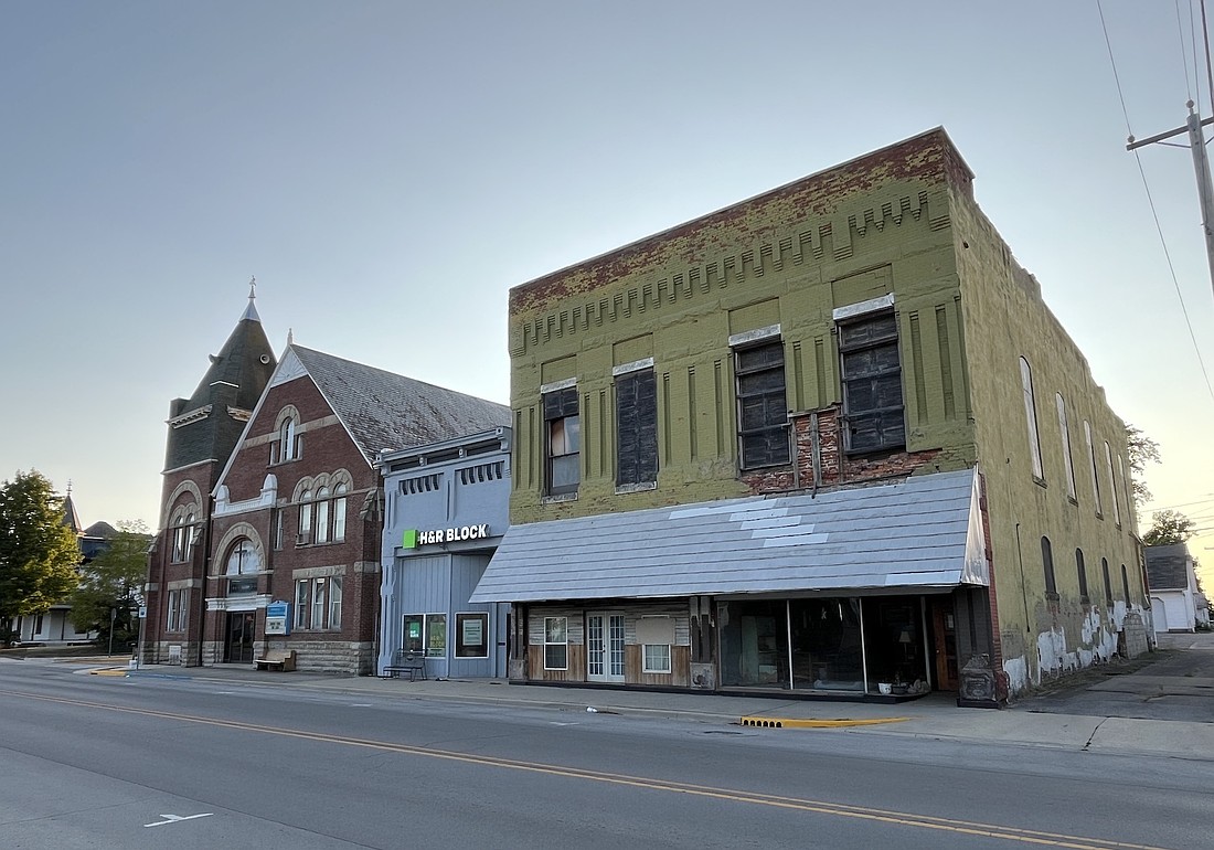 A public meeting is planned for next month for discussion of the proposed demolition of the Green Building, 303 S. Main St., Dunkirk. Ceann Bales of Jay County Development Corporation explained that the city will need public support for the project in order to help the city's application for grant funds through Indiana Office of Community and Rural Affairs. Plans are for the adjacent H&R Block building to remain in place. it's a block in transition, as Dunkirk City Council also approved a $25,000 downtown revitalization loan Monday for renovation of the former church at 326 S. Main St. (The Commercial Review/Ray Cooney)