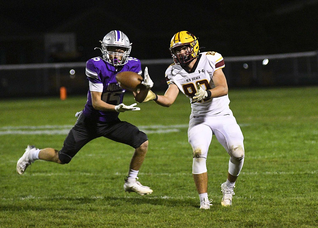 Anthony Roessner of Fort Recovery High School steps in front of a Gavin Dicke pass for an interception early in the second half of the Indians’ 20-13 victory Friday. It was the second pick of the game for FRHS and led to a Reece Wendel touchdown run. (The Commercial Review/Ray Cooney)