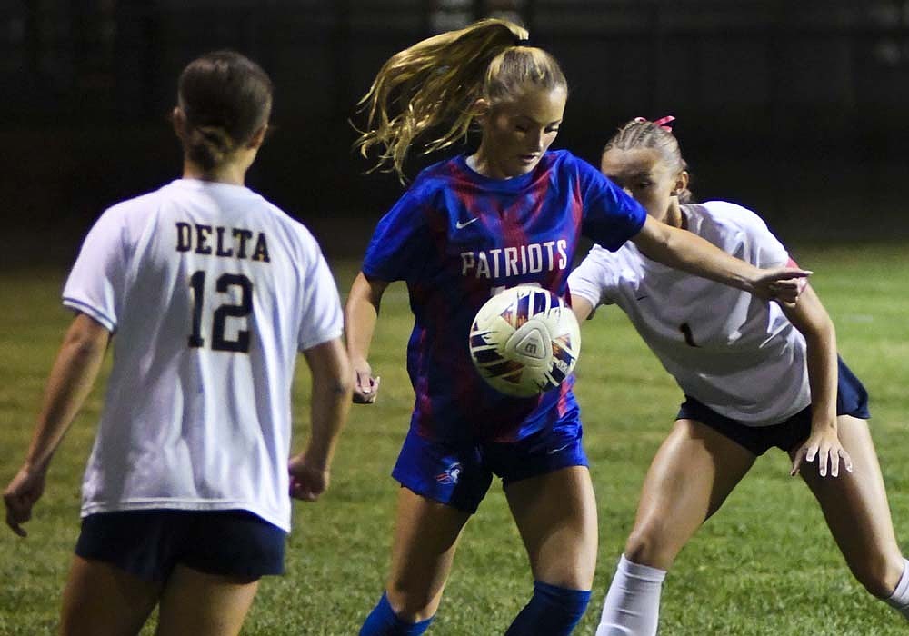 London Lloyd of the Jay County girls soccer team tries to control the ball during Thursday’s sectional semifinal match that the Patriots lost to Delta 9-0 (The Commercial Review/Andrew Balko)