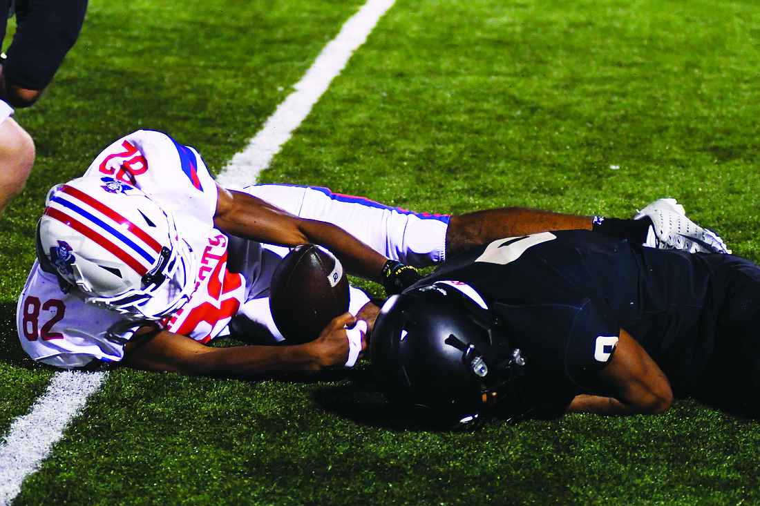 Jay County High School sophomore Sytree Jordan jumps on a fumble to give the Patriots an extra possession at Class 2A No. 3 Lapel on Friday. The Patriots will host Heritage this Friday to close out the regular season before facing Bellmont in the sectional opener. (The Commercial Review/Andrew Balko)
