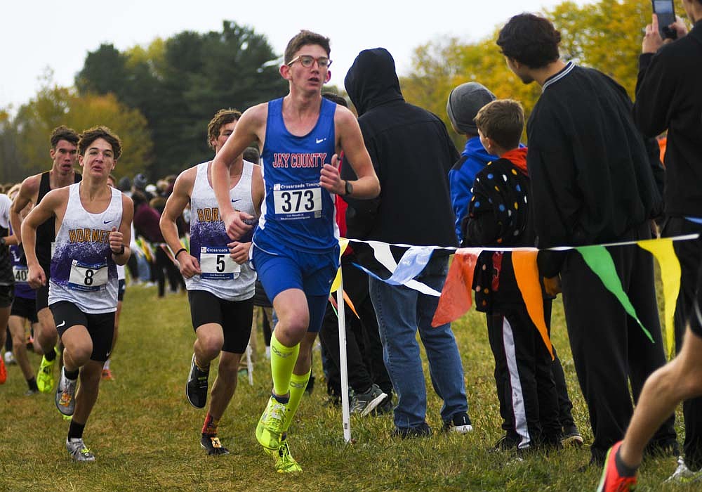 Caleb Garringer of Jay County High School makes a turn on the Huntington University cross country course during Saturday's regional meet. The junior finished 49th in 17 minutes, 0.8 seconds. (The Commercial Review/Ray Cooney)