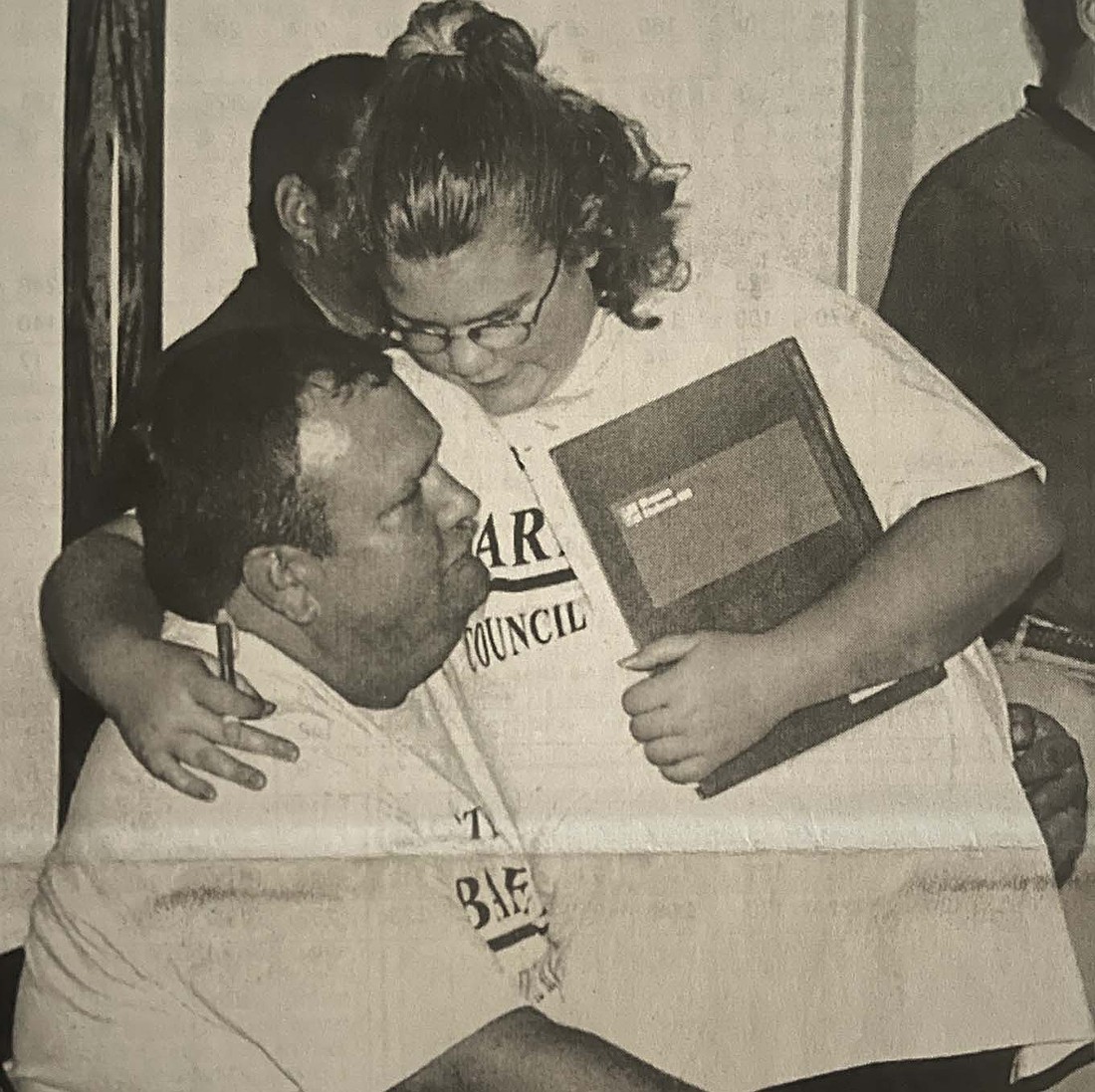 Jay County Democrats celebrated after final election results came in late on Nov. 7, 2000. Pictured, Amanda Barnett congratulates her dad Mark for taking second in a six-way race for three seats on Jay County Council. (The Commercial Review/Jennifer Dattoli)