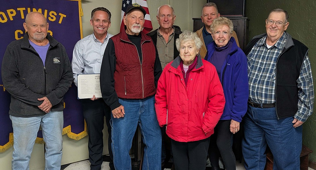 Doug Inman, executive director of The Portland Foundation, spoke at Portland Evening Optimist Club on Monday about nonprofit organization Honor Flight Northeast Indiana, which actively fundraises and coordinates honor flights for war veterans. Pictured above are veterans and club members Gary Maitlen, Doug Inman, Ferrell Blazer, Mike Leonhard, Jane Jobe, Tony Fisher, Pat Gibson and Don Shauver. (Photo provided)