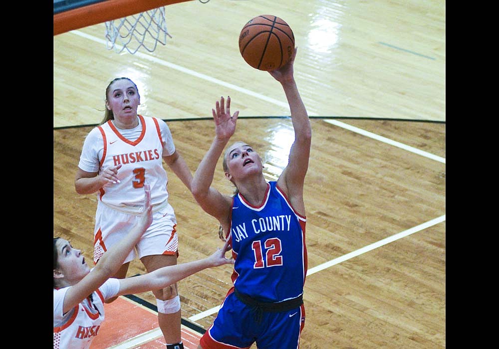 Hallie Schwieterman of Jay County High School attacks the basket late in the first half of the Patriots' 73-57 loss to host Hamilton Heights. Schwieterman scored a team-high 25 points in the defeat. (The Commercial Review/Ray Cooney)