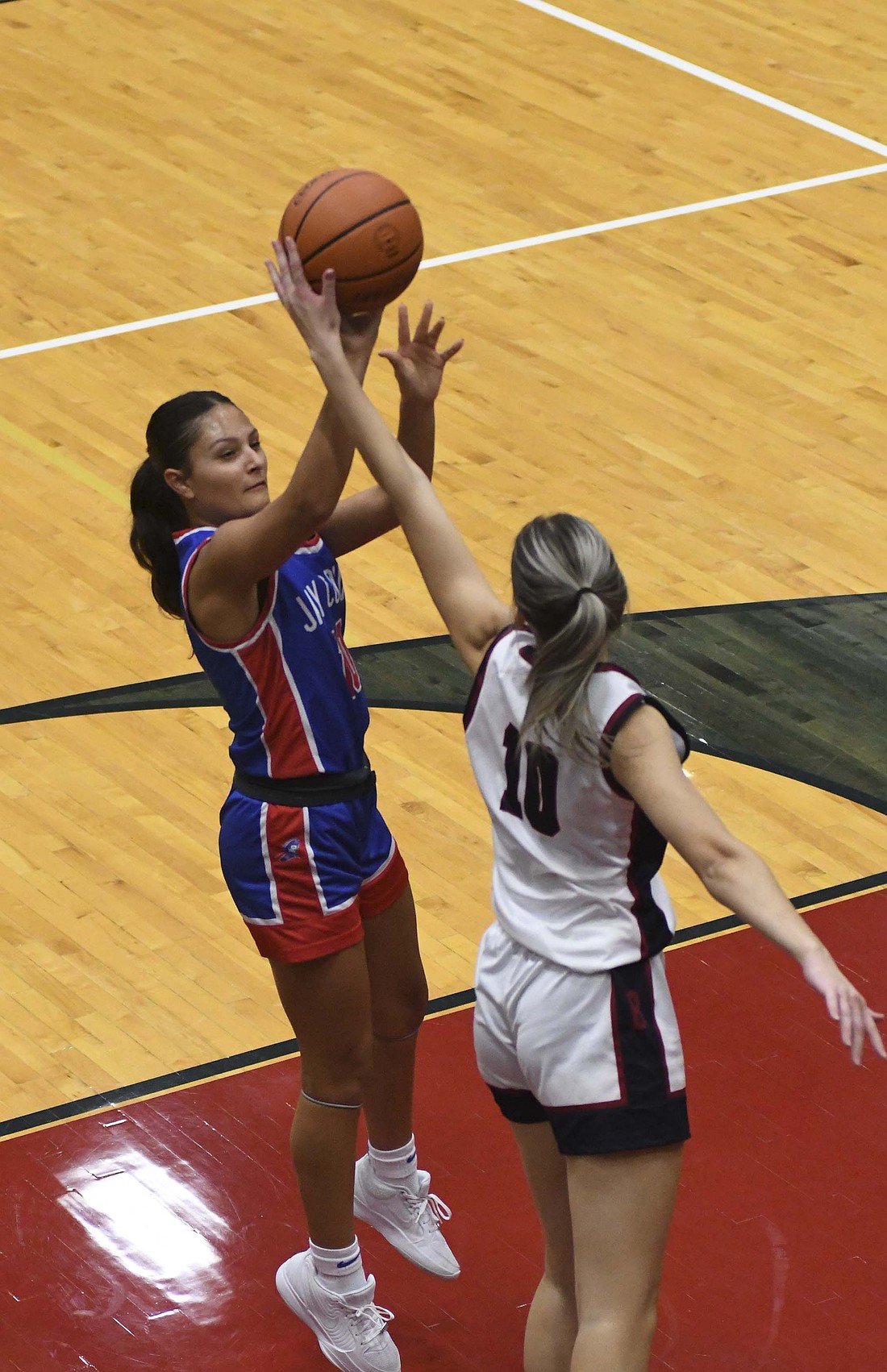 Jay County High School’s Raylah Newton pulls up for a jump shot in the middle of the lane on Friday as the Patriots fell to Class 3A No. 6 Bellmont 60-39. The Patriots struggled to score in the second half, making just four field goals. (The Commercial Review/Andrew Balko)