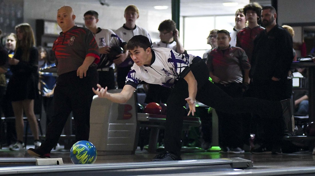 Troy Post of the Fort Recovery High School boys bowling team releases his ball during warm ups prior to Saturday’s 2,261-2,172 victory over Van Wert at Plaza Lanes. Post rolled games of 183 and 151 pins for the second-best series of 334 pins. The Indians have gotten off to a hot start to the season, winning all three of their opening matches. (The Commercial Review/Andrew Balko)