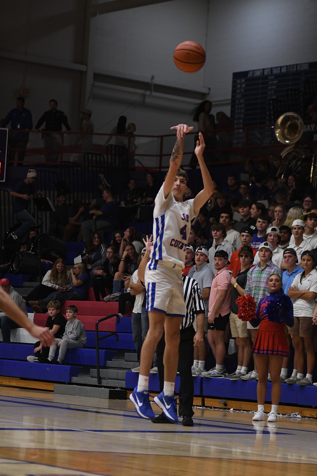 Jayden Comer of the Jay County High School boys basketball team drains a 3-pointer during the second quarter of the Patriots’ 64-57 loss to Fort Wayne South Side on Tuesday. Comer led the Patriots with 17 points and connected on all four of his attempts from beyond the arc in the second quarter. (The Commercial Review/Ethan Oskroba)