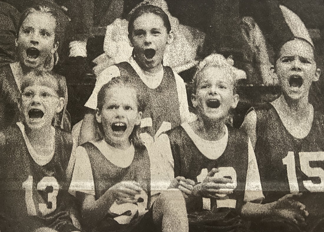 Twenty-five years ago this week, elementary school teams were battling it out for the county championship. Pictured from the Nov. 29, 2000, edition of The Commercial Review, members of the Bloomfield Elementary School girls basketball team, including (front row, from left), Stephanie Wellman, Cindy Muhlenkamp, Cassandra Huelskamp and Emily Shepherd make some noise from the bench as a Westlawn player shoots a free throw during the championship game of the Jay County girls elementary basketball tournament at Pennville Elementary. Westlawn knocked off the Bombers, 22-19. (The Commercial Review/Mike Snyder)