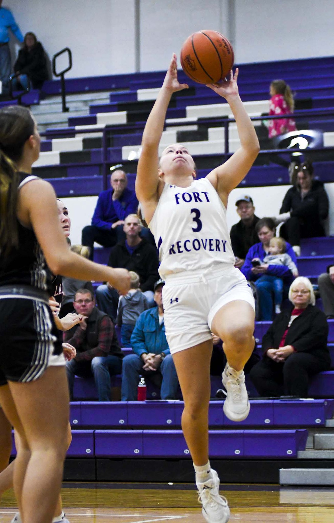 Fort Recovery High School sophomore Paisley Hart takes a layup during the Tribe’s 46-29 loss on Friday. The Indians have three games this week with road trips to Newton tonight and JCHS Saturday. (The Commercial Review/Ray Cooney)