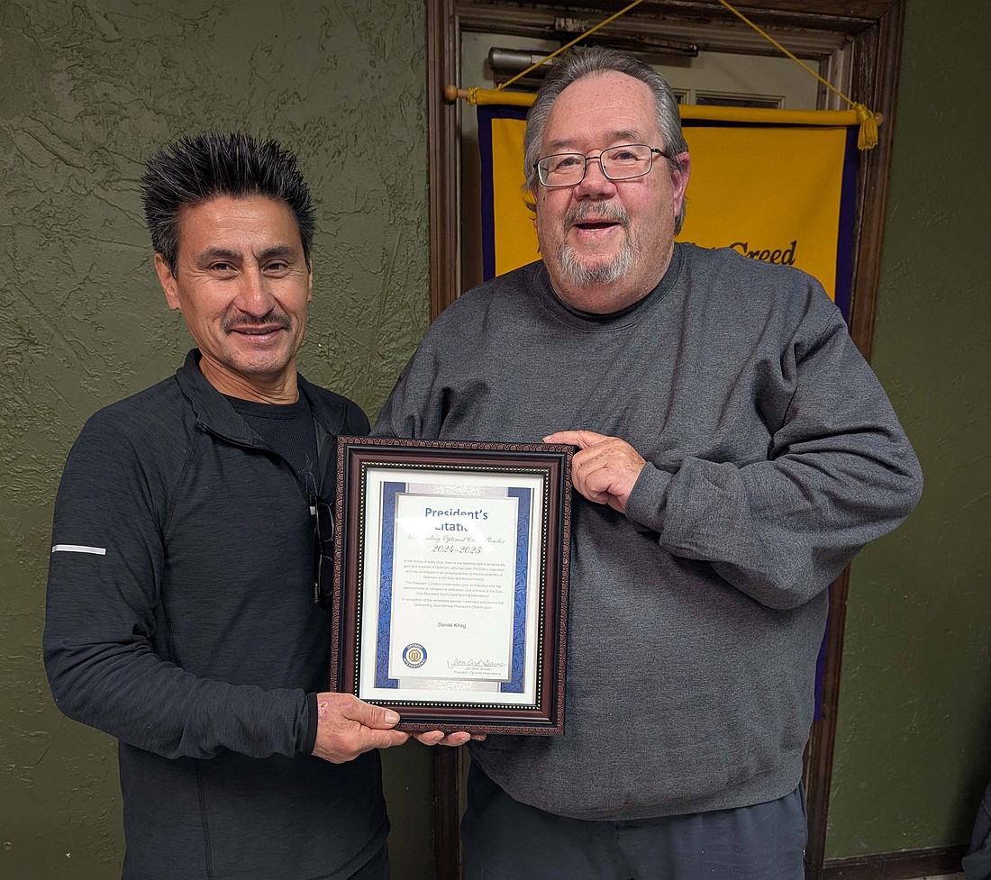 Dan Kreig, Portland Evening Optimist Club member, was recently awarded the Optimist International President’s Citation. This award is presented by the current Optimist International President to an outstanding club member who expresses the true spirit and essence of Optimism in their club and community. Pictured from left are past Portland Evening Optimist Club president Bobby Ruiz and Dan Kreig. (Photo provided)