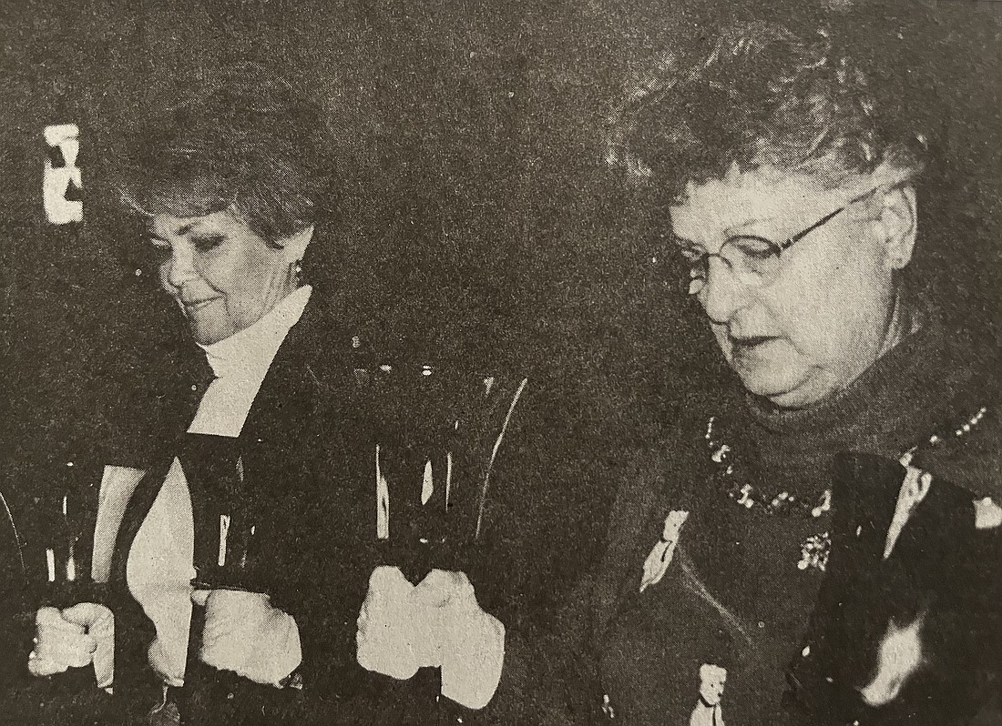 Twenty-five years ago this week, Asbury United Methodist Church’s hand bell group performed during the annual Community Christmas Carol Sing at Jay County Courthouse. Pictured from the Dec. 21, 2000, edition of The Commercial Review, Rose Snow and Pat Chittum of the hand bell group play “Joy to the World” during the performance. The carol sing included performers from local churches, Jay County High School and other groups. (The Commercial Review/Jennifer Datolli)