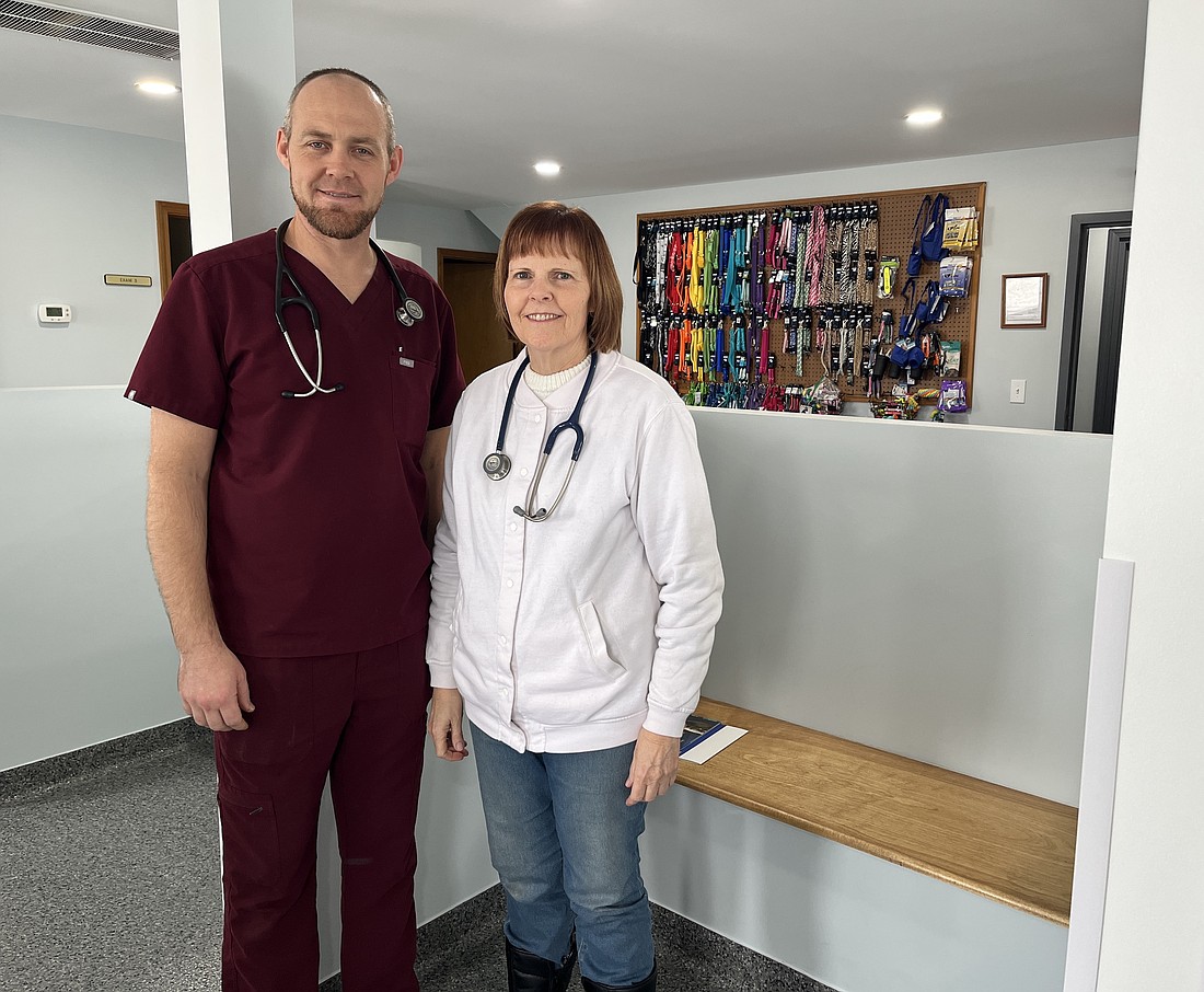 Veterinarians Zack and Teresa Wasson, son and mother, expanded their Redkey Veterinary Clinic this year with the addition of lobby and office space and an overall renovation of the facility. They noted the growth of the business over the last 10 years and the additional privacy the cubbies provide pets visiting the office at 8908 Indiana 67, Redkey. (The Commercial Review/Ray Cooney)