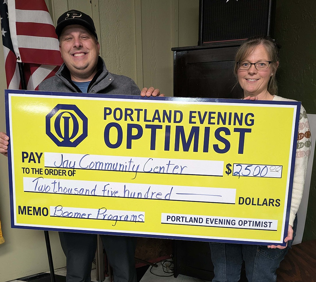 The Portland Evening Optimist Club recently donated $2,500 to the Jay Community Center for the Boomer Sports Program as well as $250 for its upcoming Family Fun Night. Pictured from left are Jay Community Center director Kyle Cook and Portland Evening Optimist Club president Cheryl Ruiz. (Photo provided)